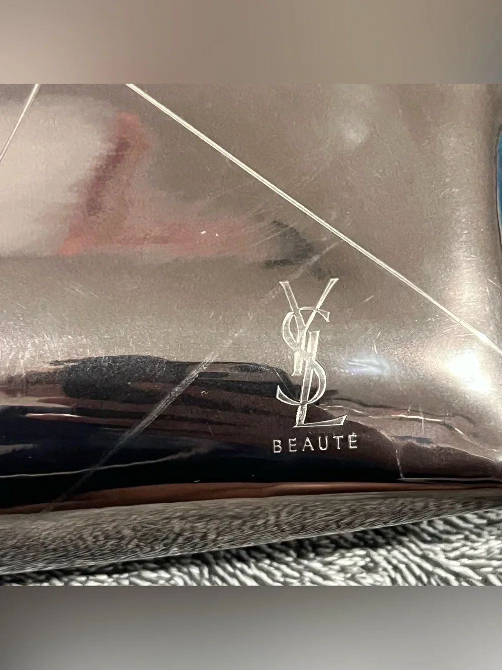 Yves Saint Laurent (YSL) metallic gunmetal cosmetic pouch